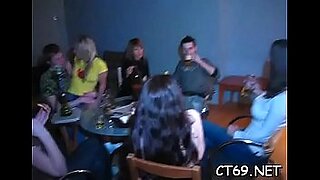 party girls dancing while other chick gives public blowjob with cumshot