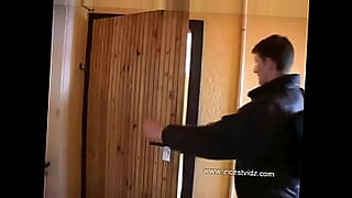 mom and son share bed in a hotel