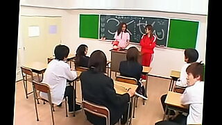 student with teacher in classroom