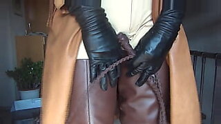 mistress ovidie wears leather gloves and makes her slave suffer